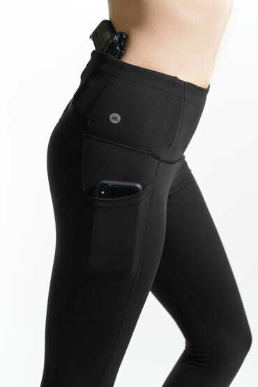 Alexo Women's 7/8 Concealed Carry Leggings in black, side view with sidearm